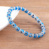 Nidin Hot Sale Lucky Evil Eye Handmade Elastic Rope Bracelets Glass Beads And 6MM Crystal 8 Colors Fine Party Adjustable Jewelry